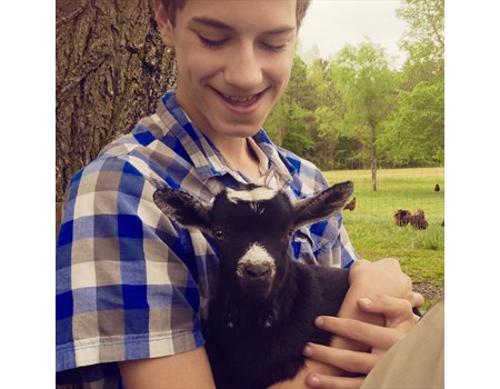 One of our twins (I can't tell them apart) with a newborn